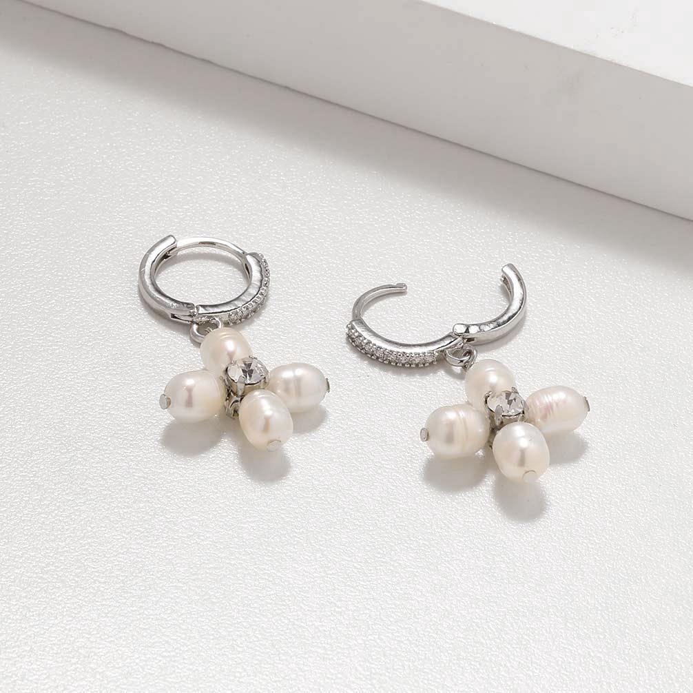 

Temperament sweet natural freshwater pearl zircon flower earrings fashionable and fresh ear buckle niche design ear-feeling woman срібний