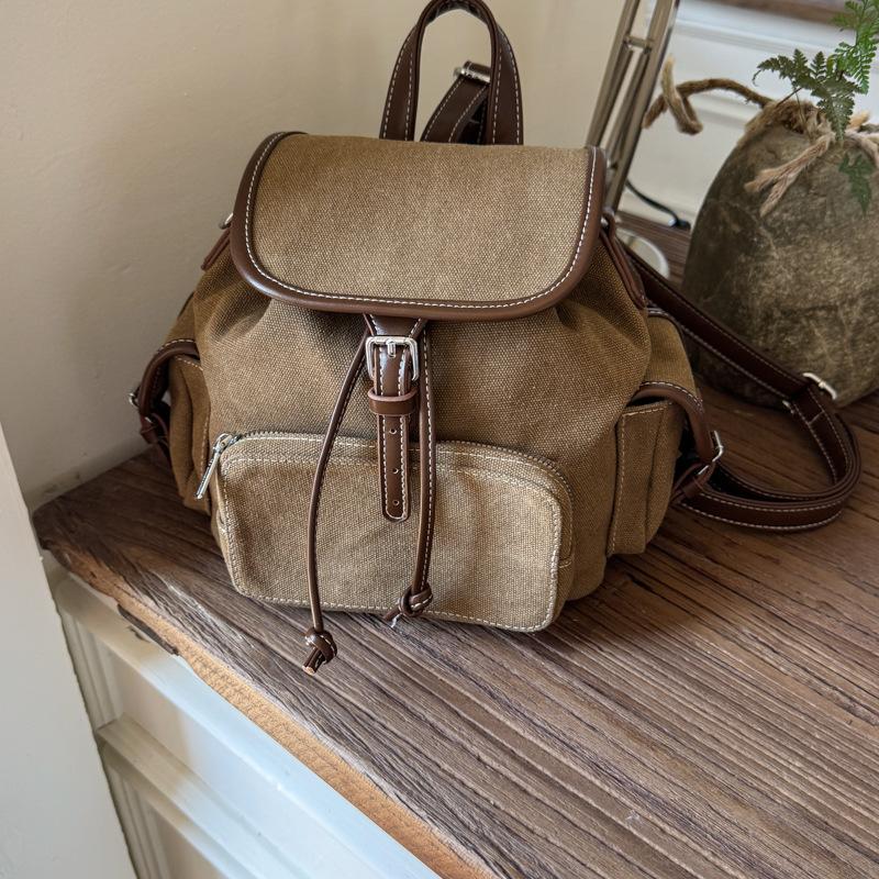 

2025 лето новый нишевый простой холщовый рюкзак ретро большая вместимость на плечо студенческий стиль портативный рюкзак хаки
