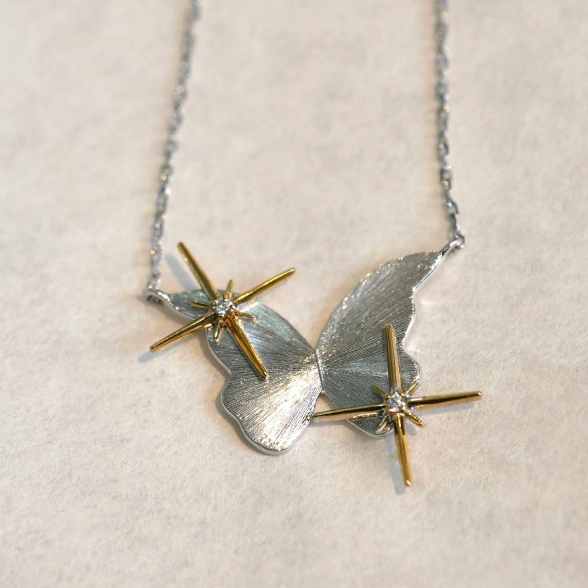 

Women s Minimalist Butterfly & Star Necklace: Stylish, Niche Design with Brushed Craftsmanship for a Light Luxury Choker Feel.