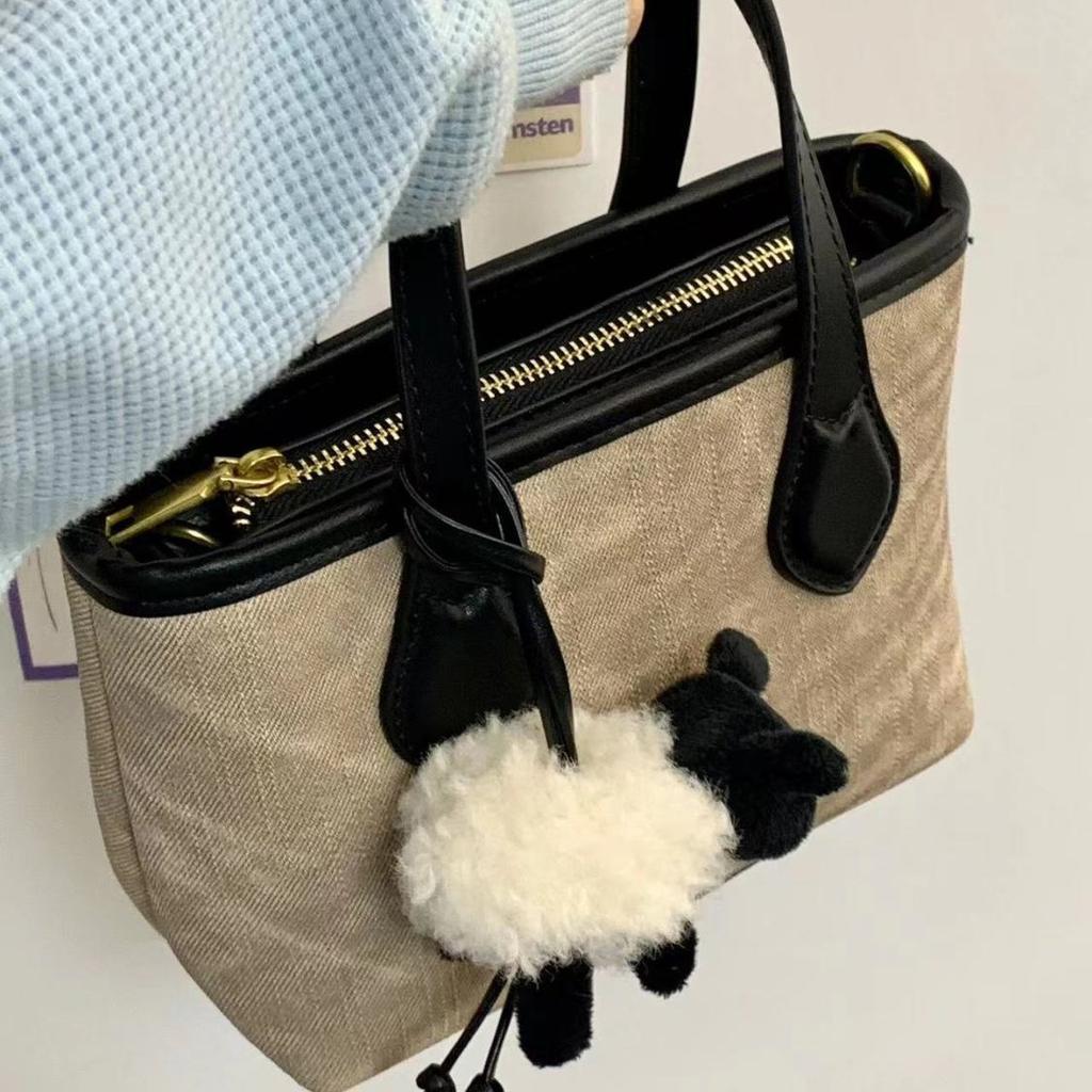 Portable bucket bag, women's retro spring popular vegetable basket bag, premium texture shoulder messenger bag