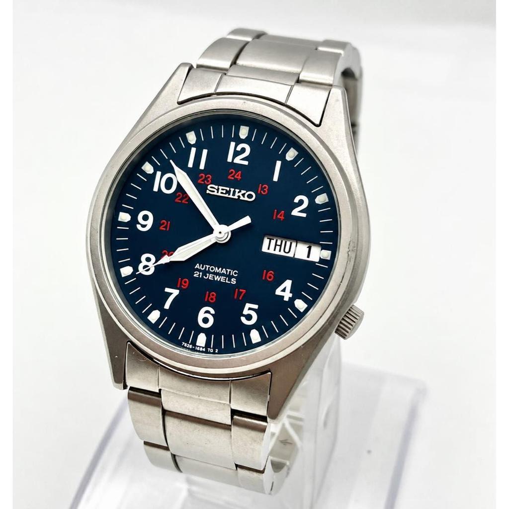 Used In good working condition SEIKO automatic men's wristwatch navy dial back skid