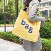 New fashionable large-capacity shoulder bag, canvas bag, women's tote casual shopping bag, small fresh letter printed bag.