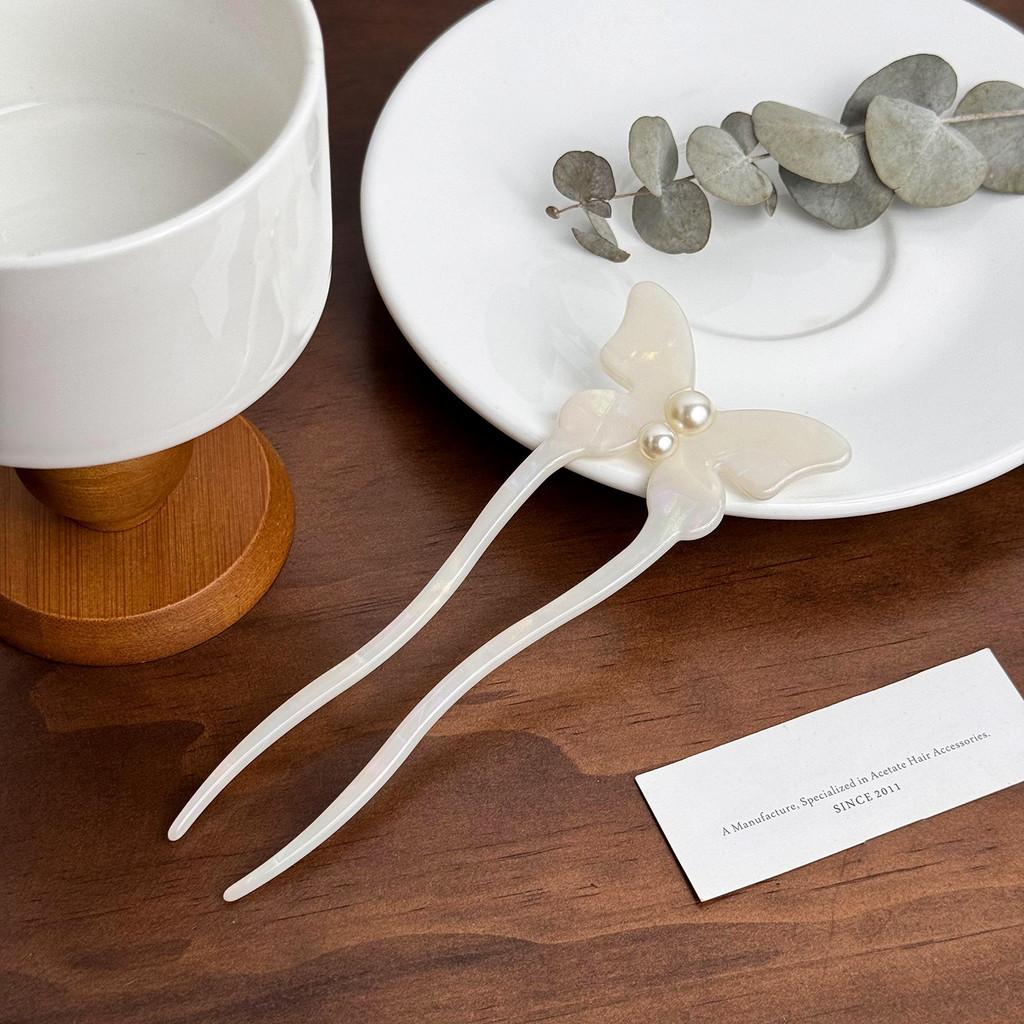 Elegant fjärilshårnål gjord av acetat med pärlinläggning Snygg U-formad hårpinne