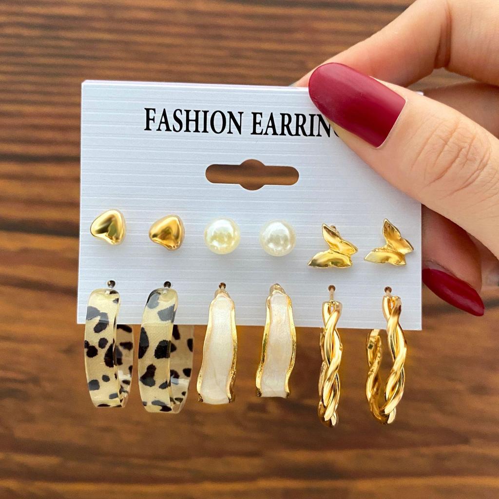 Hot-selling Retro Exaggerated Women's Peach Heart Stud Earrings Twist Twisted Pearl Earrings 11-piece Set of Earrings