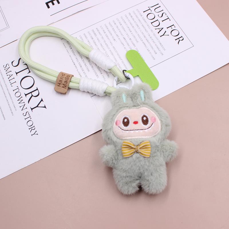 Puppenanhänger, Rucksackanhänger, Damenhandtaschenanhänger, Handyhüllenanhänger.