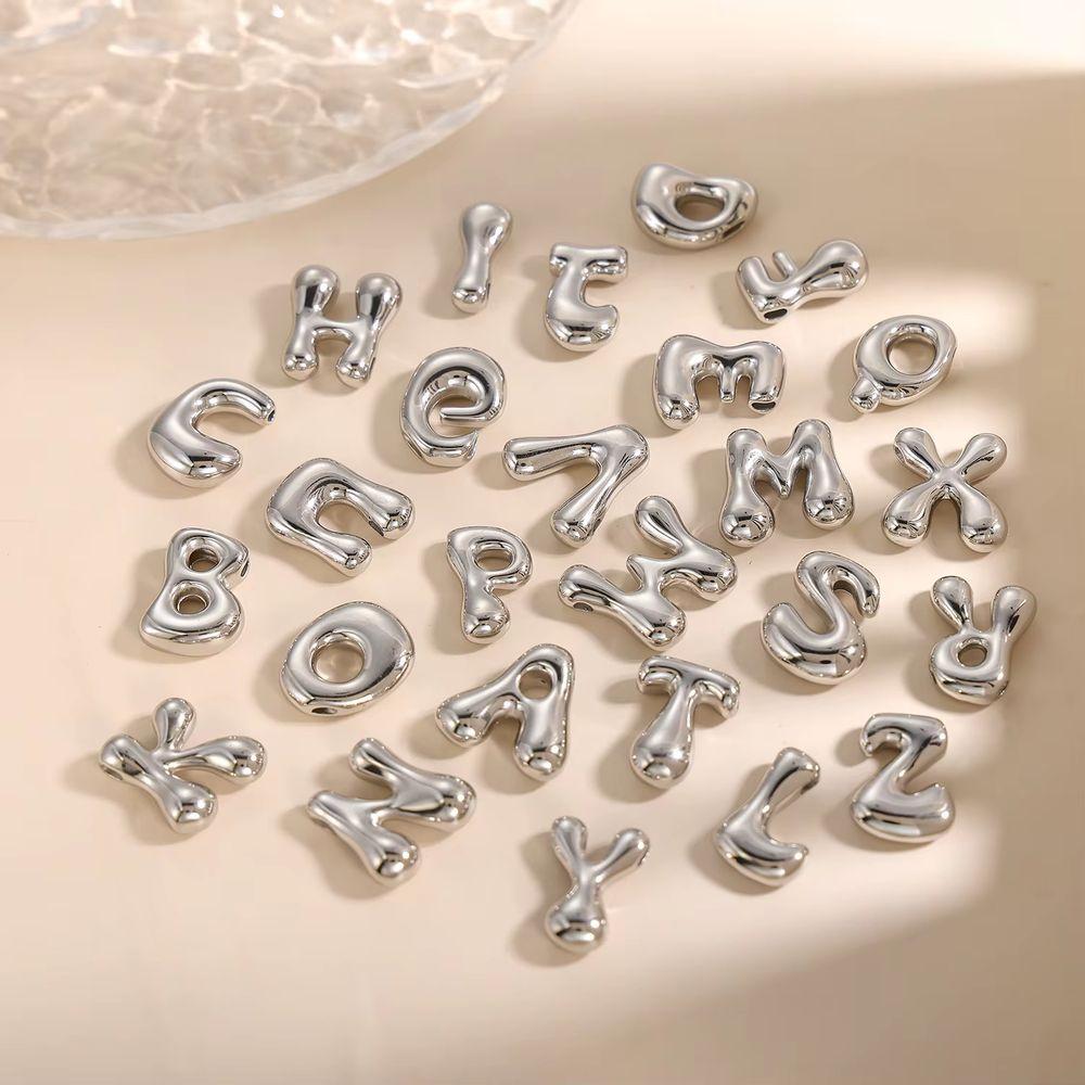 CARLIDANA Gold Plated Stainless Steel 26 Letter Charms Set Heart Bubble Initial A-Z Alphabet Letter Pendants for DIY Jewelry