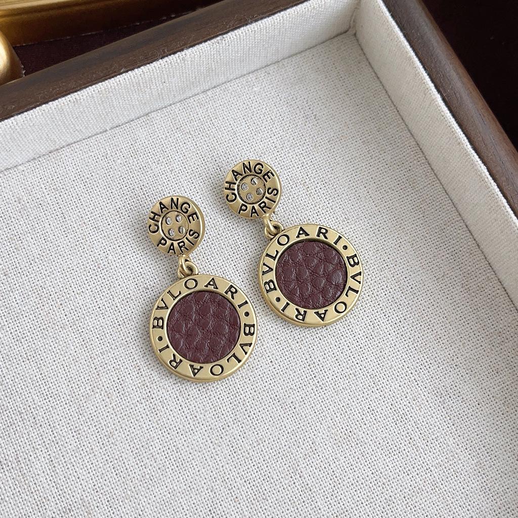 Boucles d'oreilles géométriques vintage en perles pour femmes - Style rétro de Hong Kong, luxe léger, sensation haut de gamme