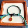 Tibetan Wealth Gods Handmade Eight-Strand Braided Bracelet with Green Tara Thangka