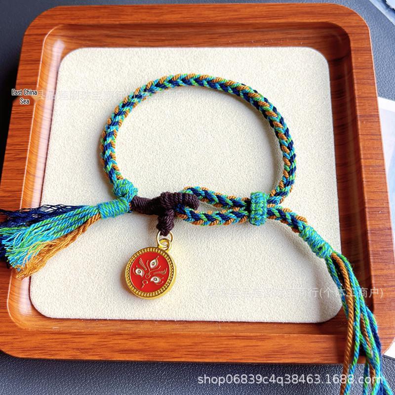 Tibetan Wealth Gods Handmade Eight-Strand Braided Bracelet with Green Tara Thangka