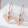 Ungewöhnliche roségoldfarbene lange Hängeohrringe für Damen Geometrische hohle Blume Accessoires Täglicher Vintage-Schmuck
