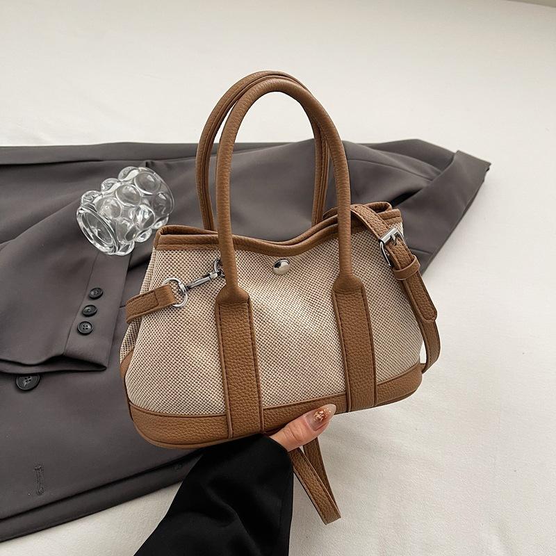 Summer new fashion contrast large-capacity hand-held bucket bag women's simple casual commuter shoulder body bag