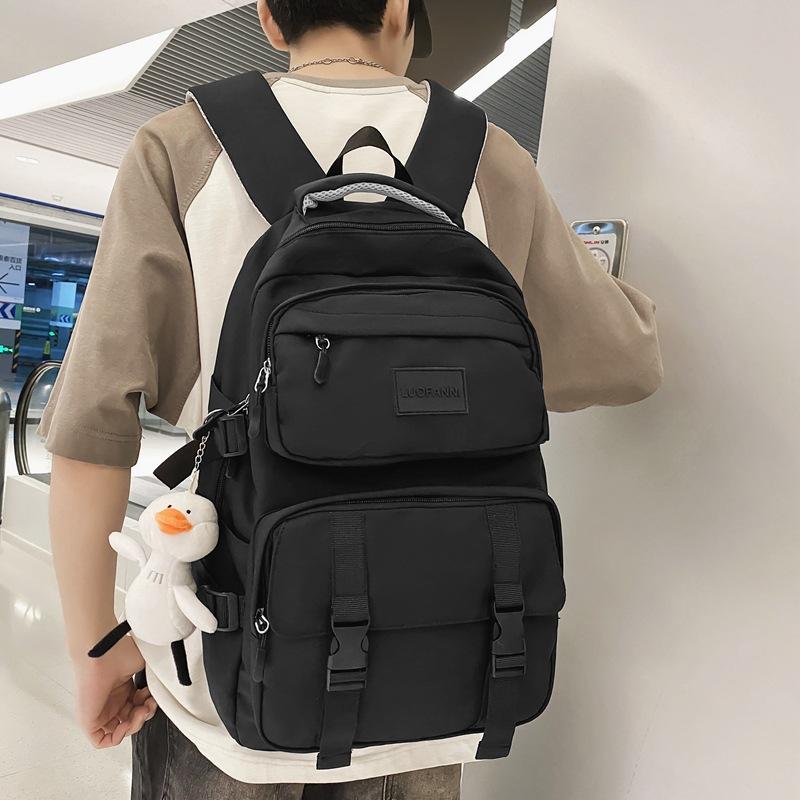 Solid color multi-pocket schoolbag female Korean version high school college student backpack light color couple large capacity ins backpack