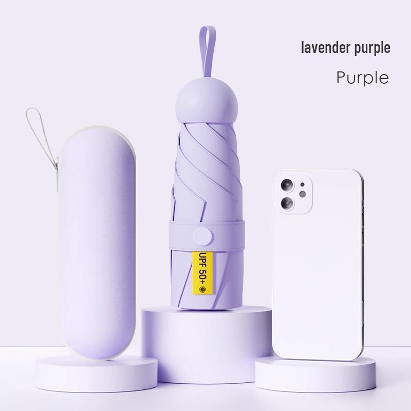 "Portable Capsule Umbrella: Compact, High-End Sunshade & Rain Protection"