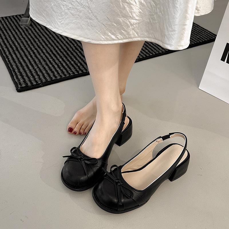 

Французский темперамент женские одинарные туфли с бантом полые босоножки с сумкой на голове 2025 весна новые нежные и милые задние пустые низкие каблуки 35