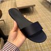 Fashion One Word Slippers for Women Summer 2025 Simple Leather Toe Exposed Women's Shoes Beach Shoes French Niche Sandals Outdoor Wear
