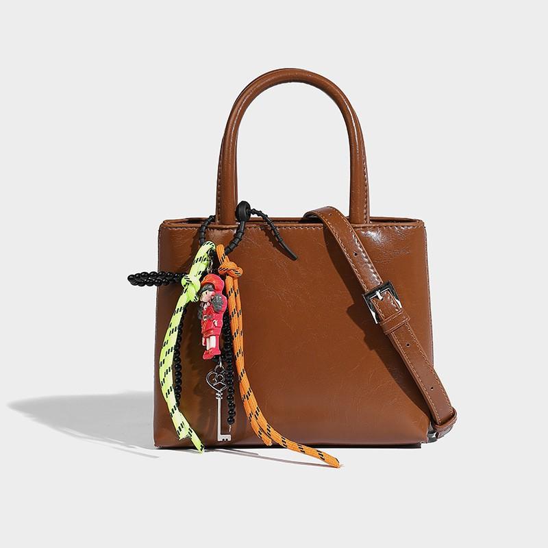 

2025 New Style Niche Design Handbag Fashionable High-end All-match Commuting One-shoulder Cross-slung Tote Female Bag коричневий