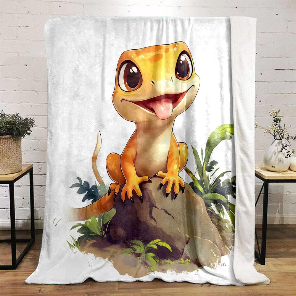 Cute Gecko Smiling on a Rock Patterned flannel blanket perfect for the bedroom living room, sofa, or a little nap