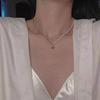 Design Sense Pearl Asymmetrical Splicing Clavicle Chain Metal Chain Love Pendant Necklace Female Explosion
