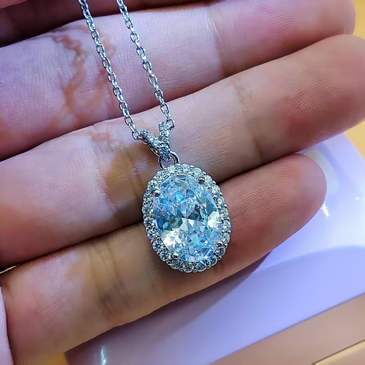 Подвеска-ожерелье с цветным драгоценным камнем в форме яйца, с бриллиантом с высоким содержанием углерода, женская модная изысканная овальная циркониевая цепочка для ключиц, ювелирное изделие Copper gold-plated.