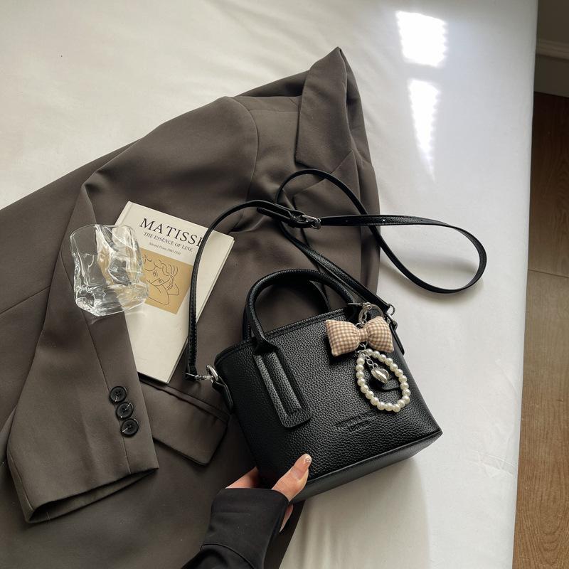 Autumn and winter new small bag women's premium texture portable bucket bag versatile retro commuter messenger bag