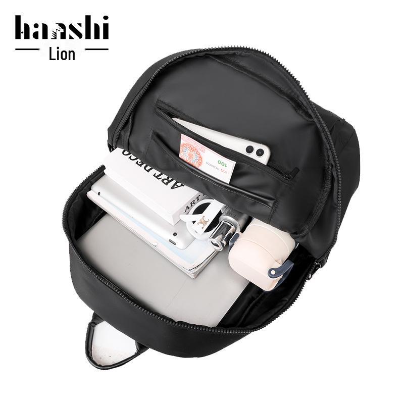 High-End Casual Waterproof Nylon Backpack: Fashionable, Lightweight Travel Bag for Men & Women, with Shoulder Straps & Laptop Compartment.
