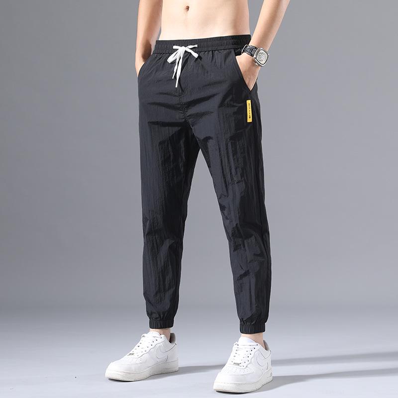 

Мужские ультратонкие однотонные дышащие нейлоновые спортивные брюки на шнурке 29