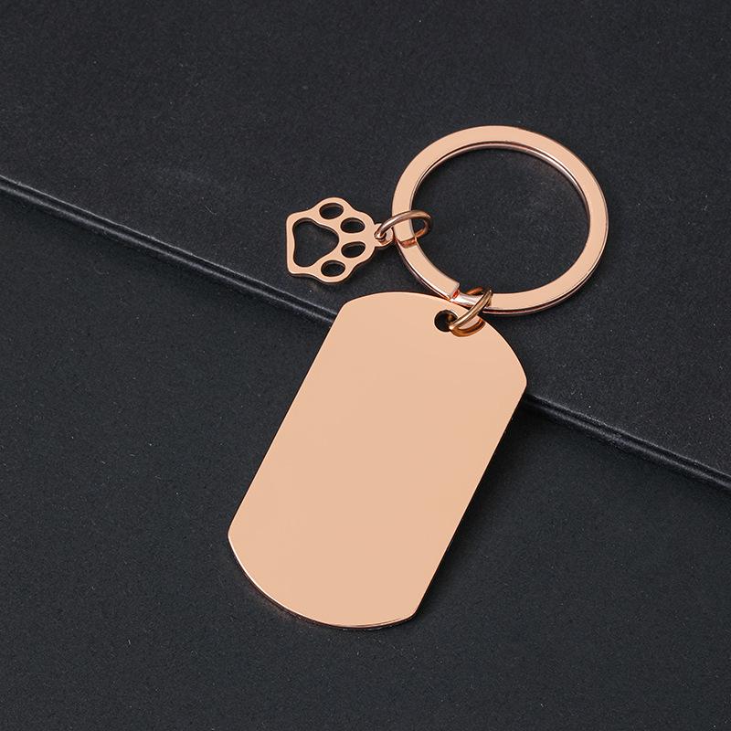 Breloczek do kluczy z łapą psa drukowaną laserowo - Międzynarodowy metalowy prezent