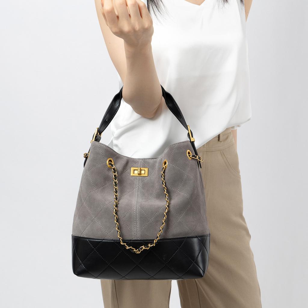 Damska skórzana torba typu bucket crossbody o dużej pojemności, z wysokiej klasy charakterem dojazdowym