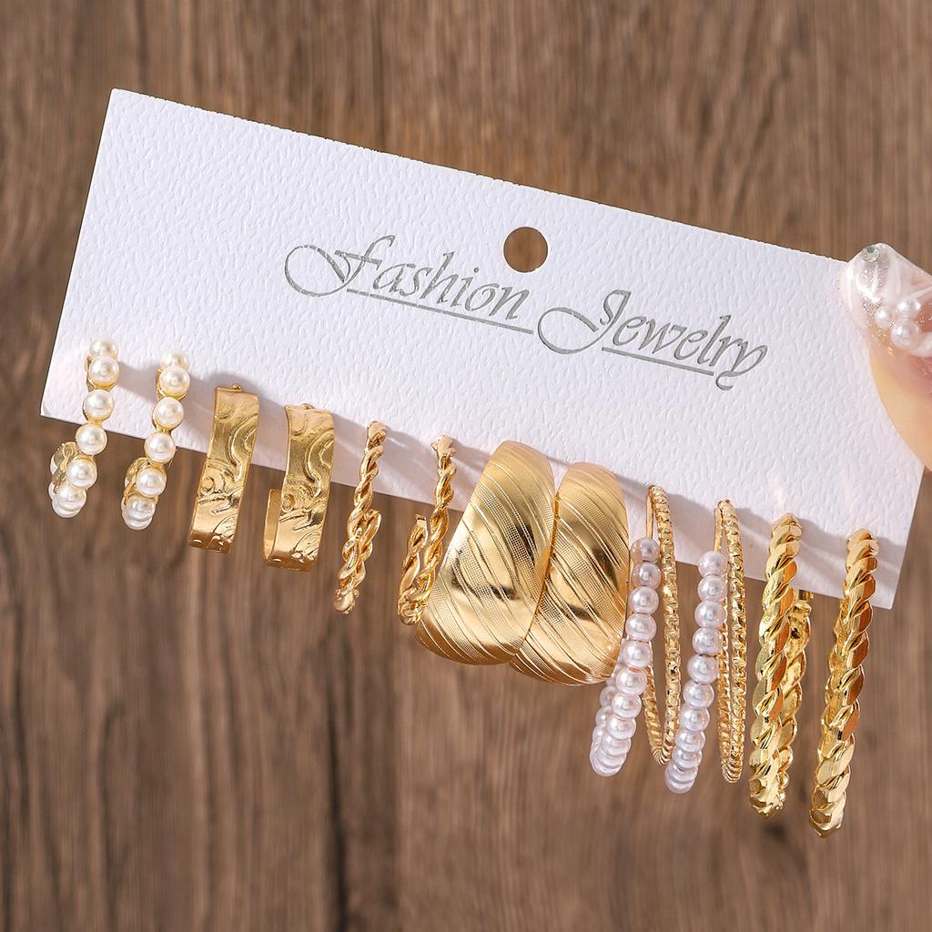 European and American new earrings set 1 pair of golden metal twist pearls creative retro simple and versatile earrings