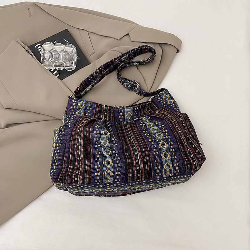 

2025 новая сумка-тоут женская сумка студенческая нишевая большая вместимость плечевая сумка для отдыха сумка-мессенджер фиолетовый