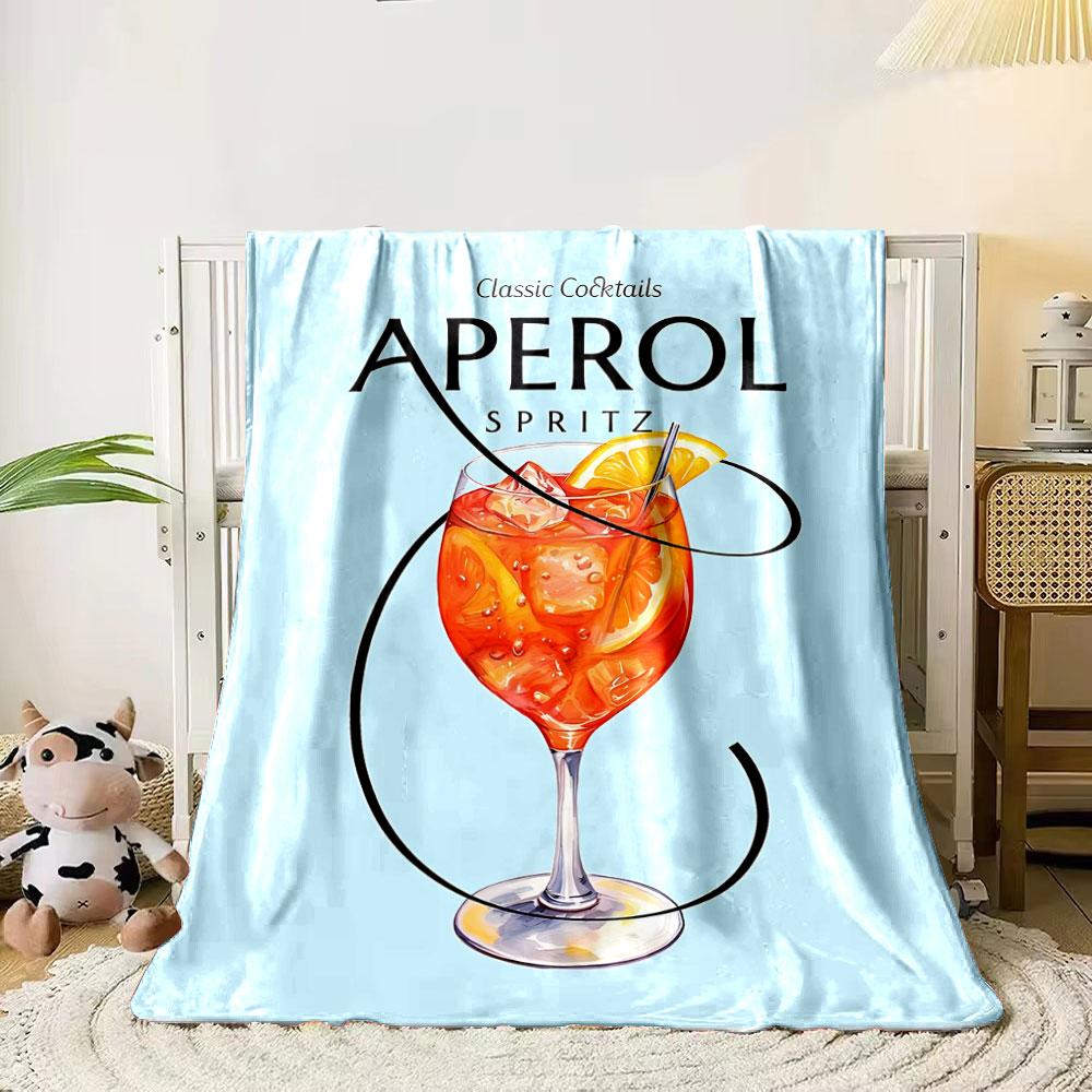 A beach scene featuring a large Aperol Spritz glass in the foreground. for all seasons blanket lunch break throw gift 80cm x 120cm