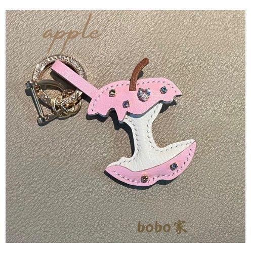 

Handmade genuine leather keychain for Apple handbag with double-sided stitching, creative and cute gift