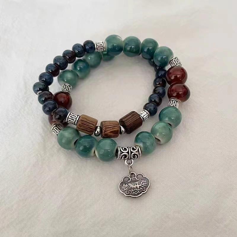 Keramikperlenarmband für Damen, Ethno- und Exotik-Stil, elastisches Seil, chinesisch inspiriertes Design
