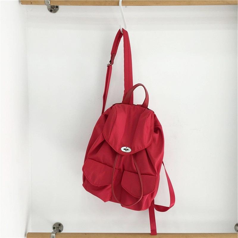 Nouveau sac à dos en nylon imperméable anti-rides pour femme, été décontracté, multi-poches, couleur unie, sac à dos de ville