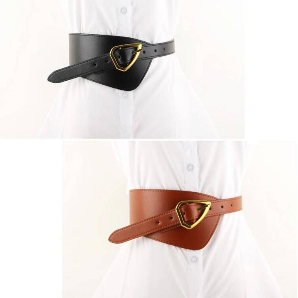 The Wide Belt Of The Woman Is Decorated With A Suit Jacket And Jacket Accessories In Black Color, Which Is Fashionable And Versatile.