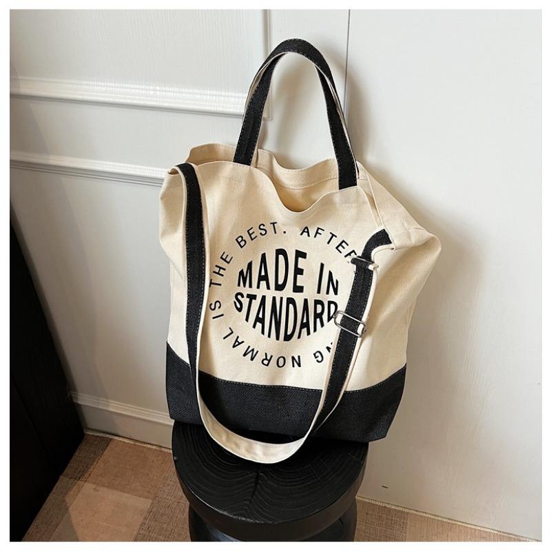 

Niche casual canvas bag women s spring and summer new students class commuting shoulder bag trendy messenger bag чёрный