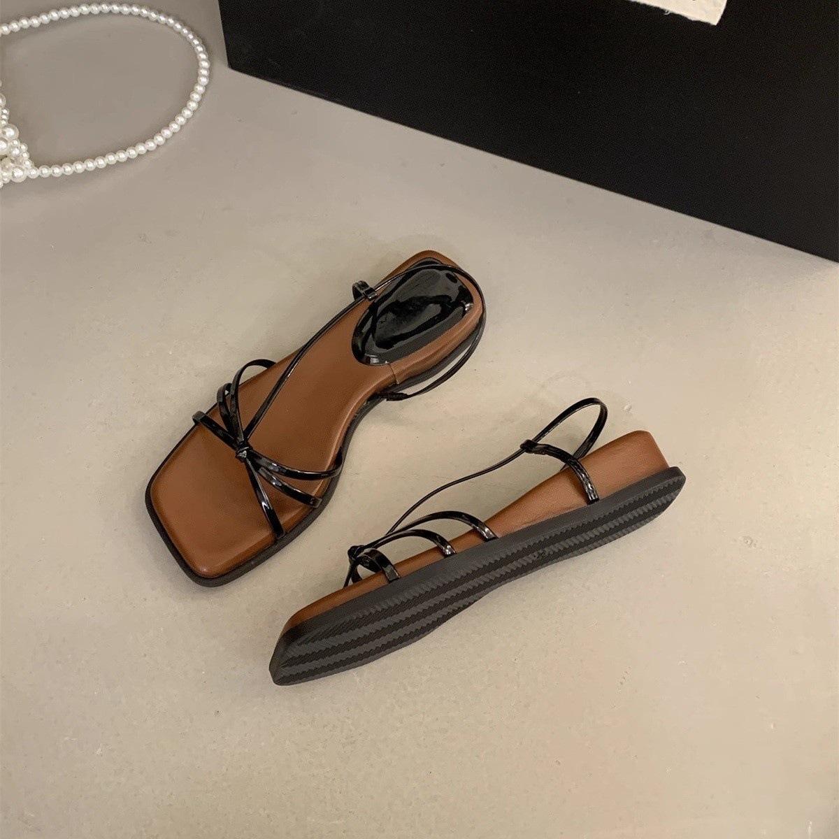 

French fairy style one-word thin strap sandals female summer 2025 new outer wear wedge heel thick sole Roman beautiful sandals 40