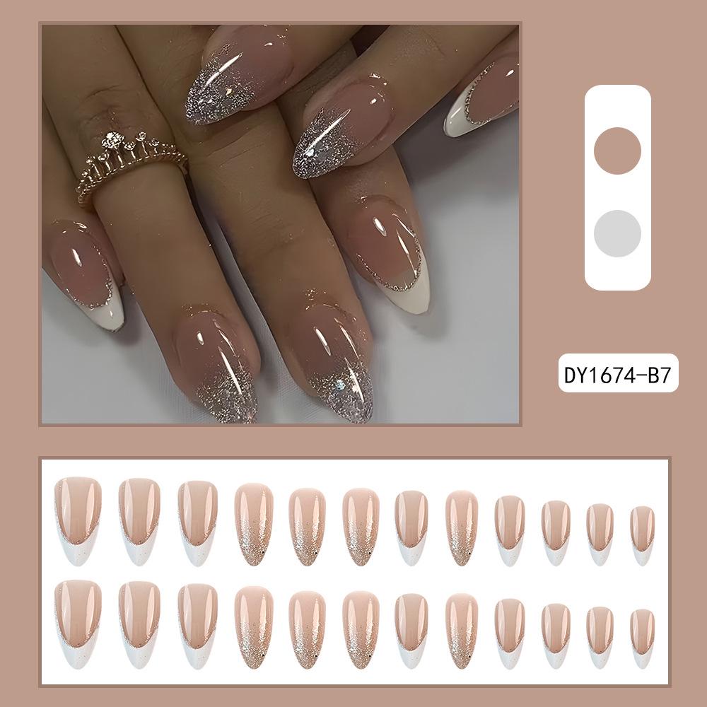 

Ногти-капли французский белый край с блестками