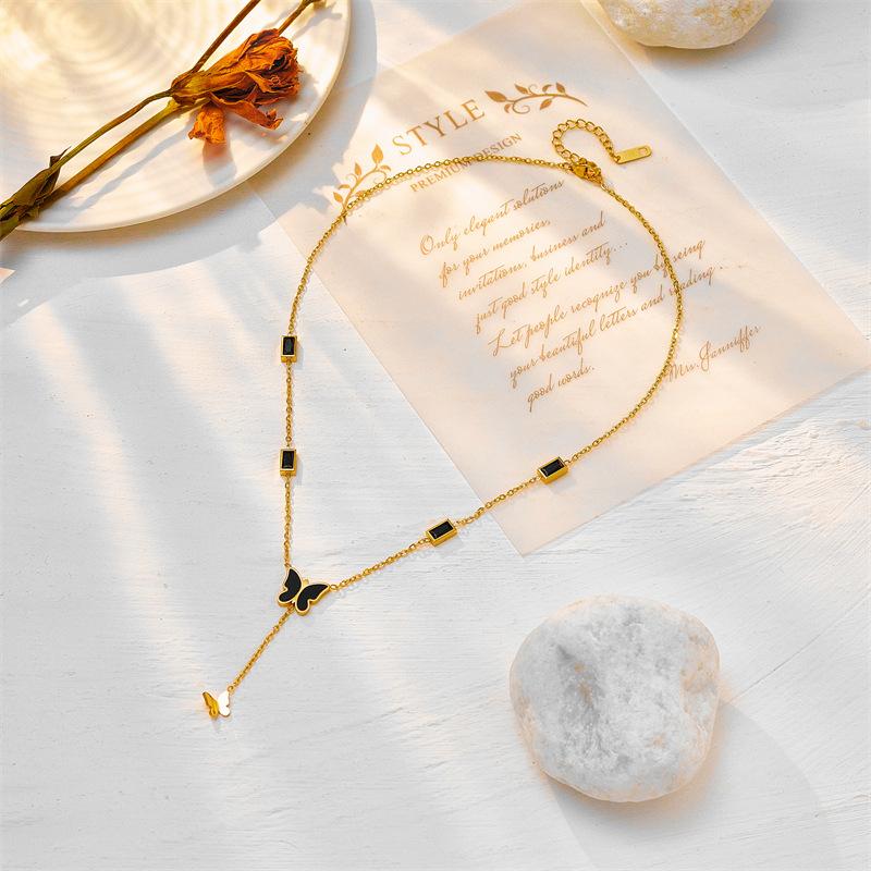 Gold Tone Black Enamel Butterfly Y-Drop Necklace with CZ Accents