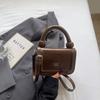 Simple high-end portable small square bag 2025 summer new niche trend fashion casual versatile shoulder women's bag
