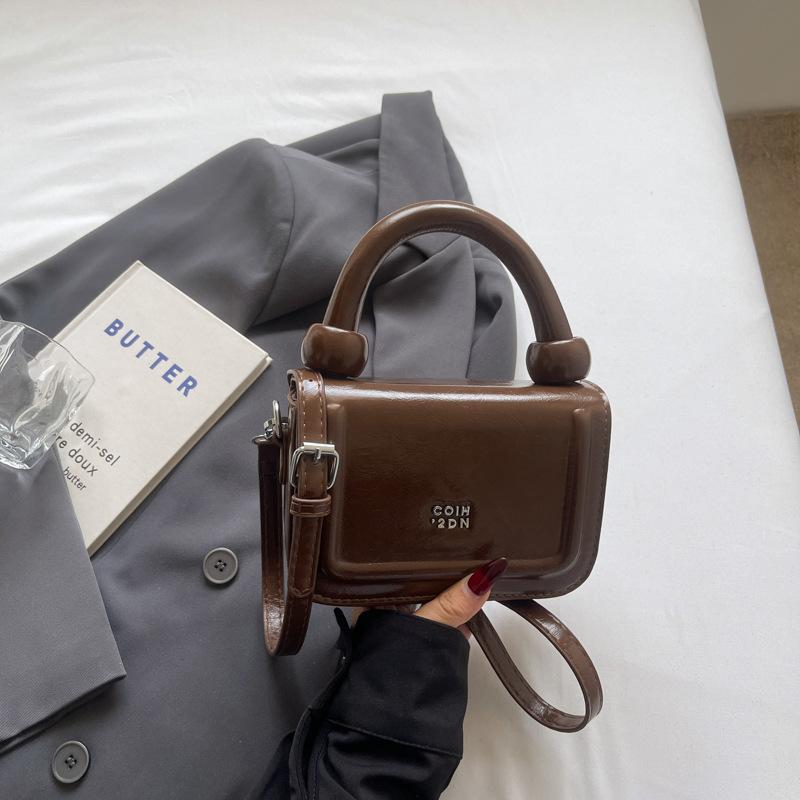 Simple high-end portable small square bag 2025 summer new niche trend fashion casual versatile shoulder women's bag