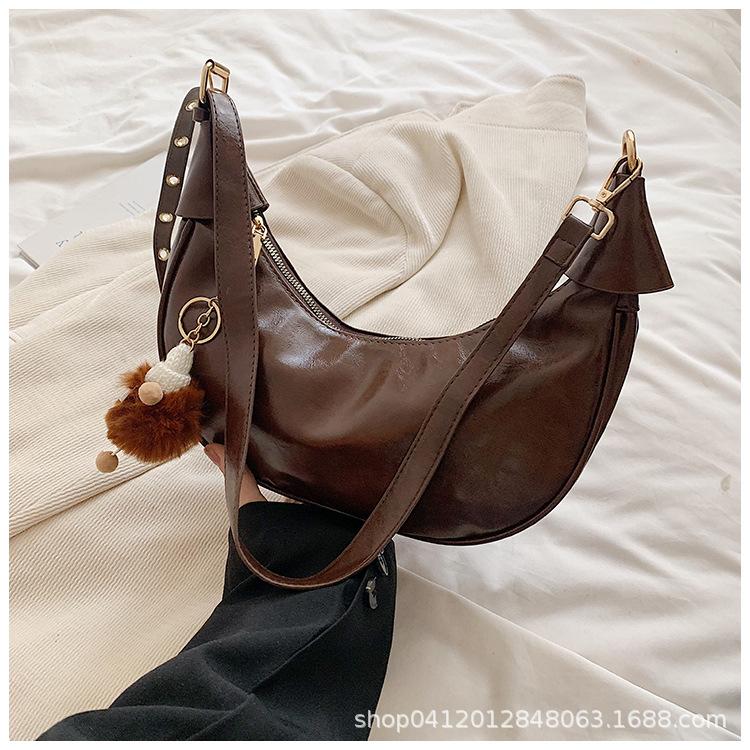 

This year s popular super hot niche bag 2025 summer new women s bag Internet celebrity explosion messenger bag foreign style dumpling bag темно-коричневого кольору