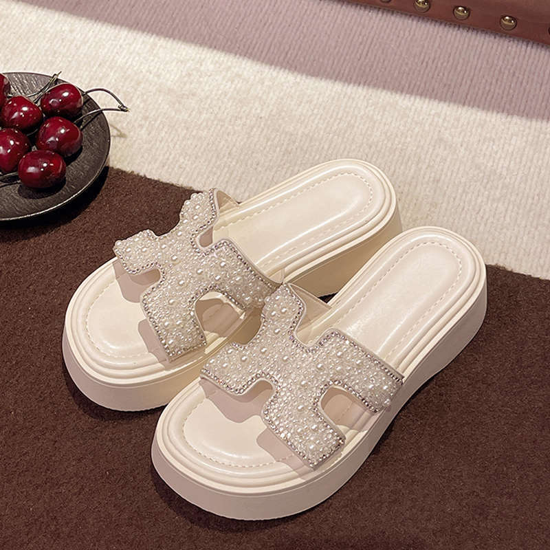 

Internet celebrity senior sense black slippers women s summer 2025 new outer wear thick bottom one-word drag casual explosion sandals increase 35