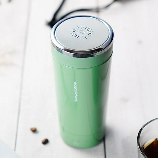 Mofei Portable Electric Heating Kettle - Mini Insulated Travel Cup for Office Use.