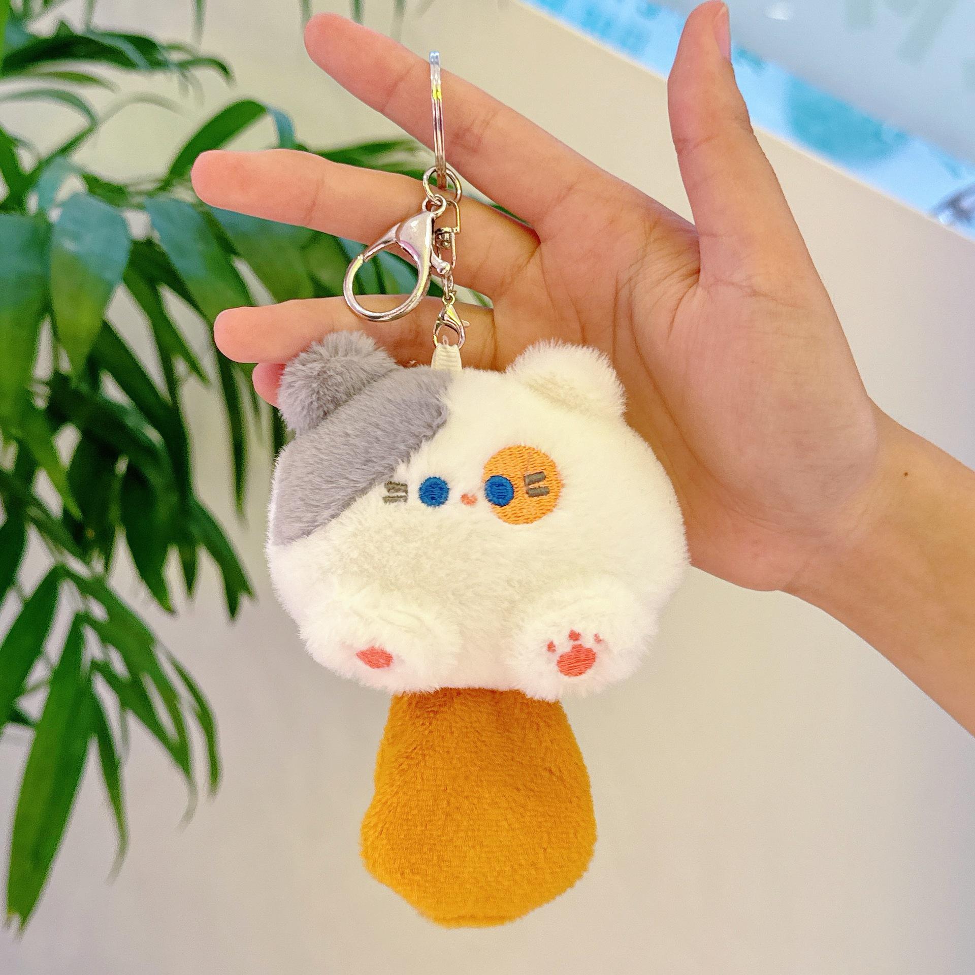 

Очаровательный пищащий плюшевый брелок-шарм в виде котенка Height approximately 12 cm