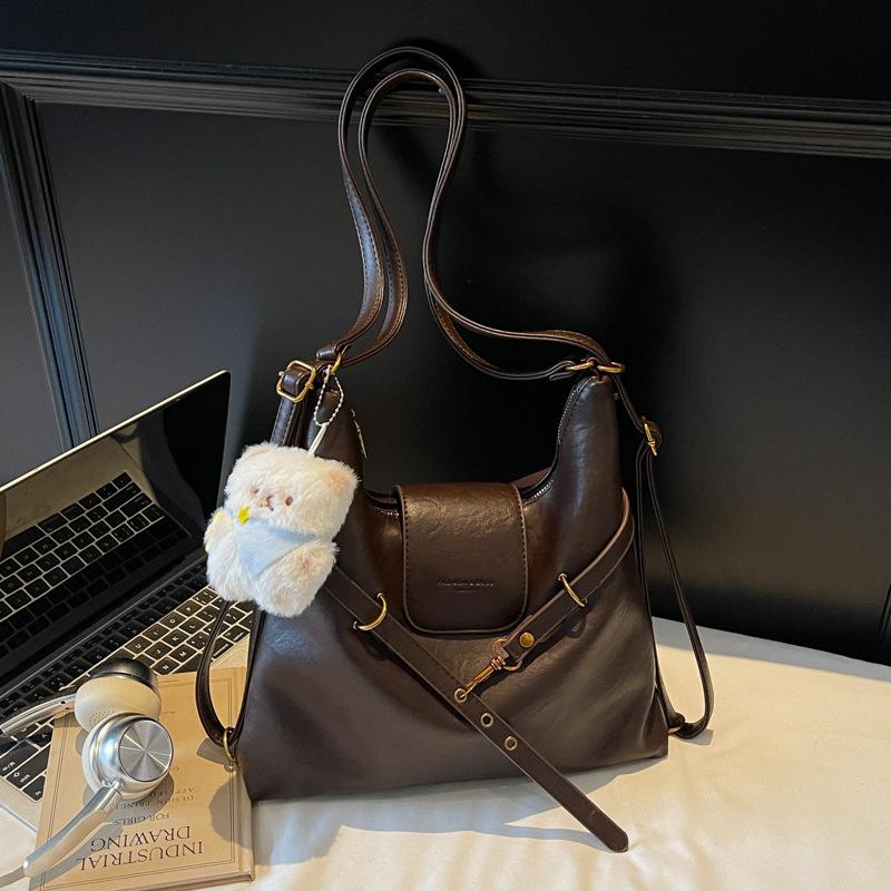 

New autumn and winter tote bag 2025 women s bag commuting large capacity niche single shoulder crossbody backpack luggage without pendant темно-коричневого