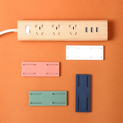 Hot Selliing Desktop Socket Fixer No Drilling Socket Holder Home  Racks Wall-Mounted Cable Wire Organizer Self-Adhesive Wall Mounted Storage