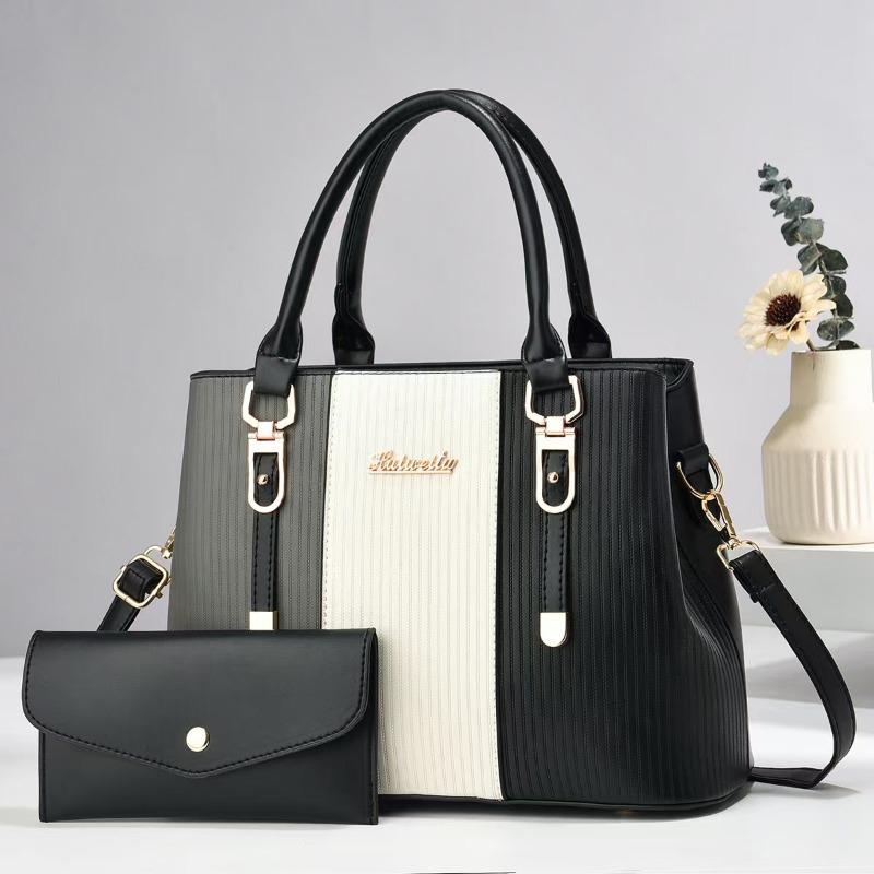 

ew strip embossed tassel splicing contrasting color large capacity shoulder oblique span women s bag large bag mother and child bag чёрный
