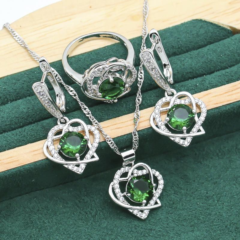 

Европа и Соединенные Штаты Популярный комплект ожерелья, серег, кольца, браслета в форме сердца с цветной инкрустацией цирконием 10 yards