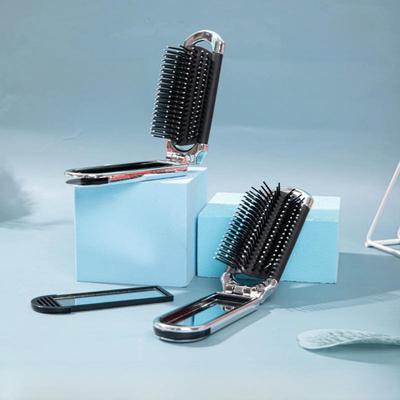 Faltbarer Mini-Massagekamm mit Luftkissen und Doppelfunktion und Spiegel